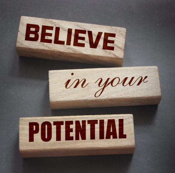 believe,in,your,potential,word,written,on,wooden,blocks.,motivation